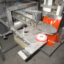 5560 Newtec 2000 with G40 tape twister bagger