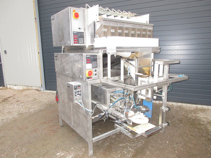 5343 Newtec 2000/G40 weigher and bagger