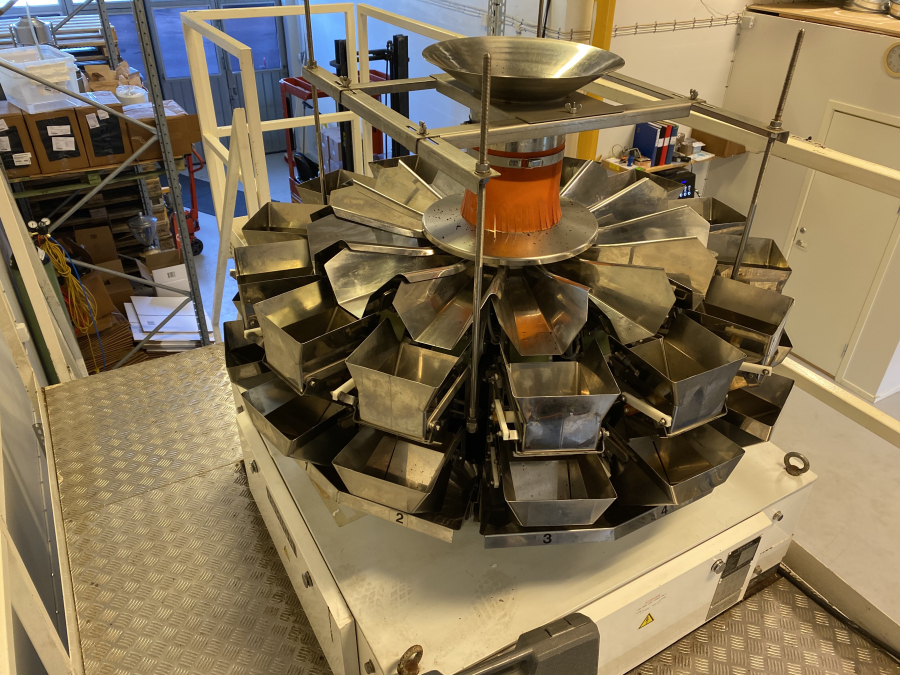 5741 Ishida multihead weigher with Pentavac vertical bagger
