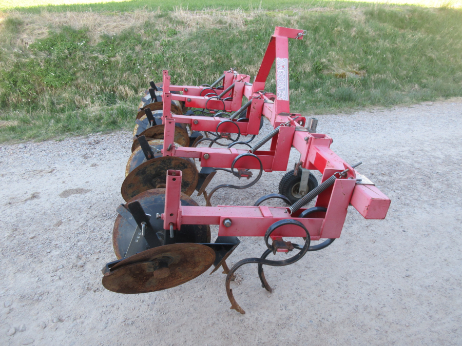 5850 Farmatic disc ridger 4 row