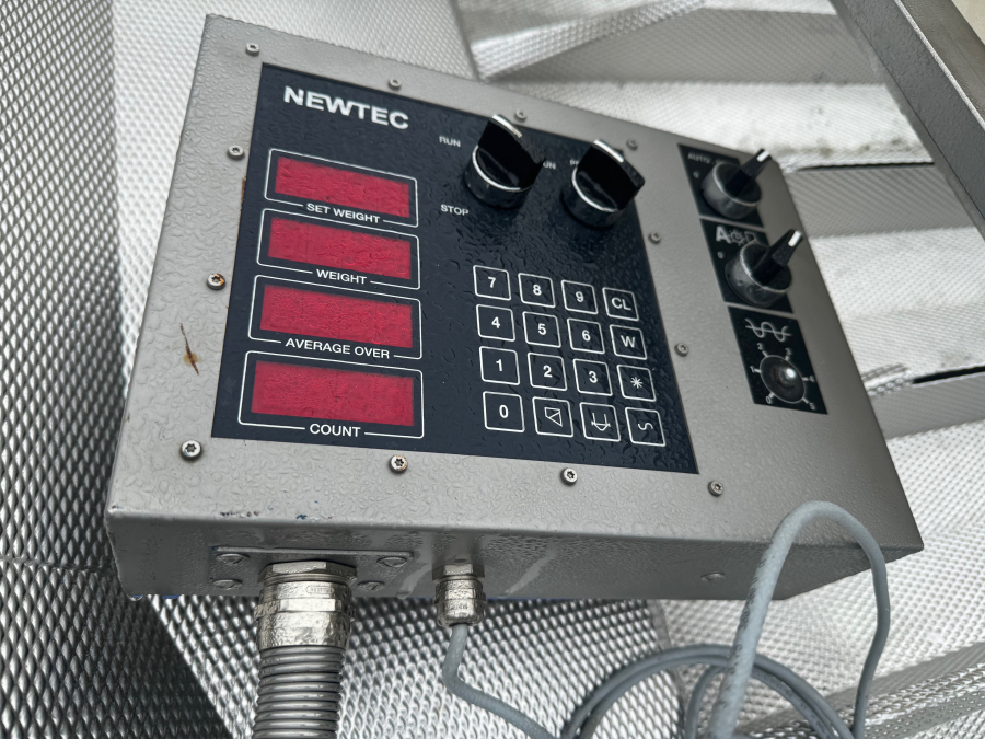 6094 Newtec PCB weigher 9 head with older JASA